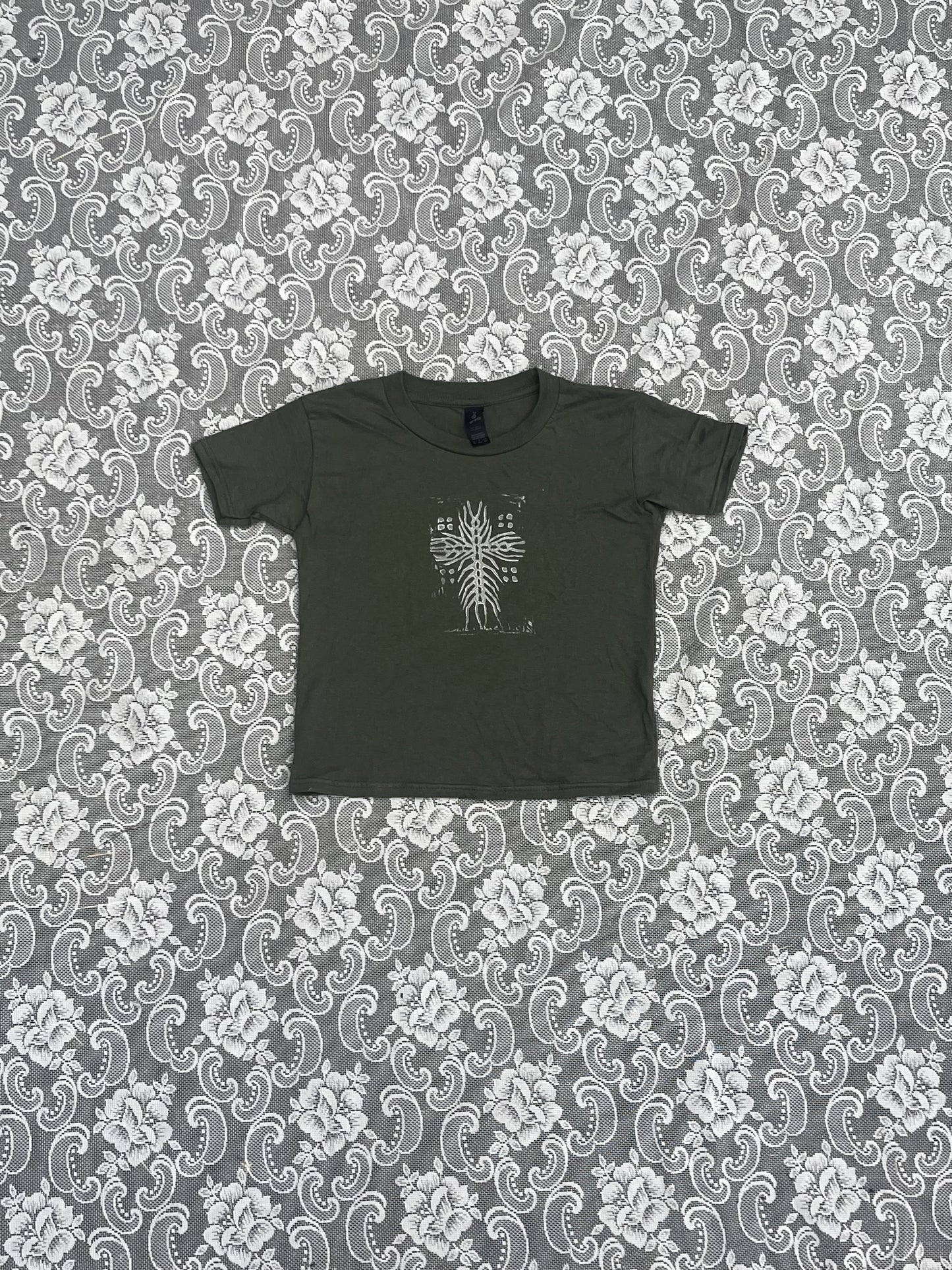 army green centipede cross block print XS baby tee