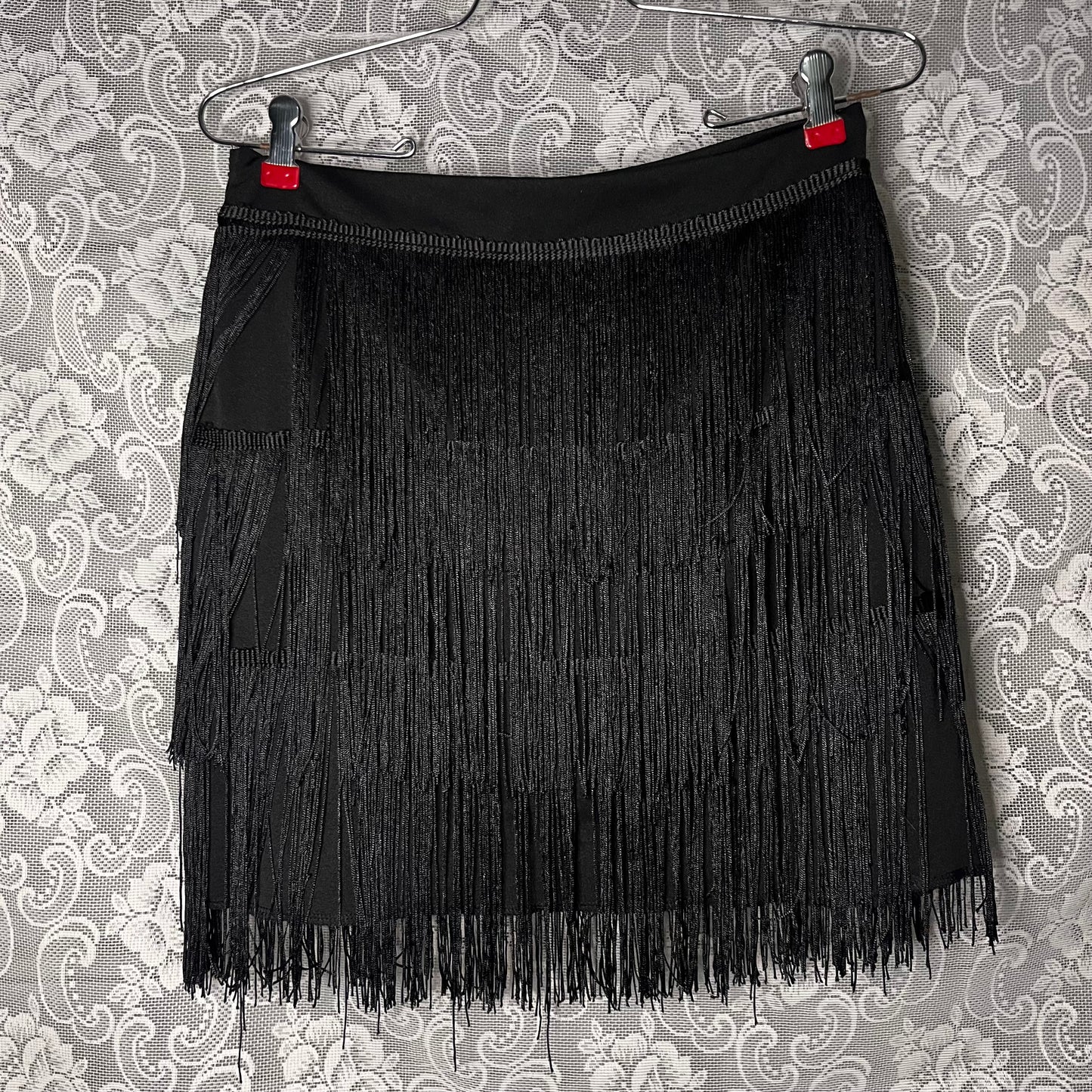 black fringe mini skirt