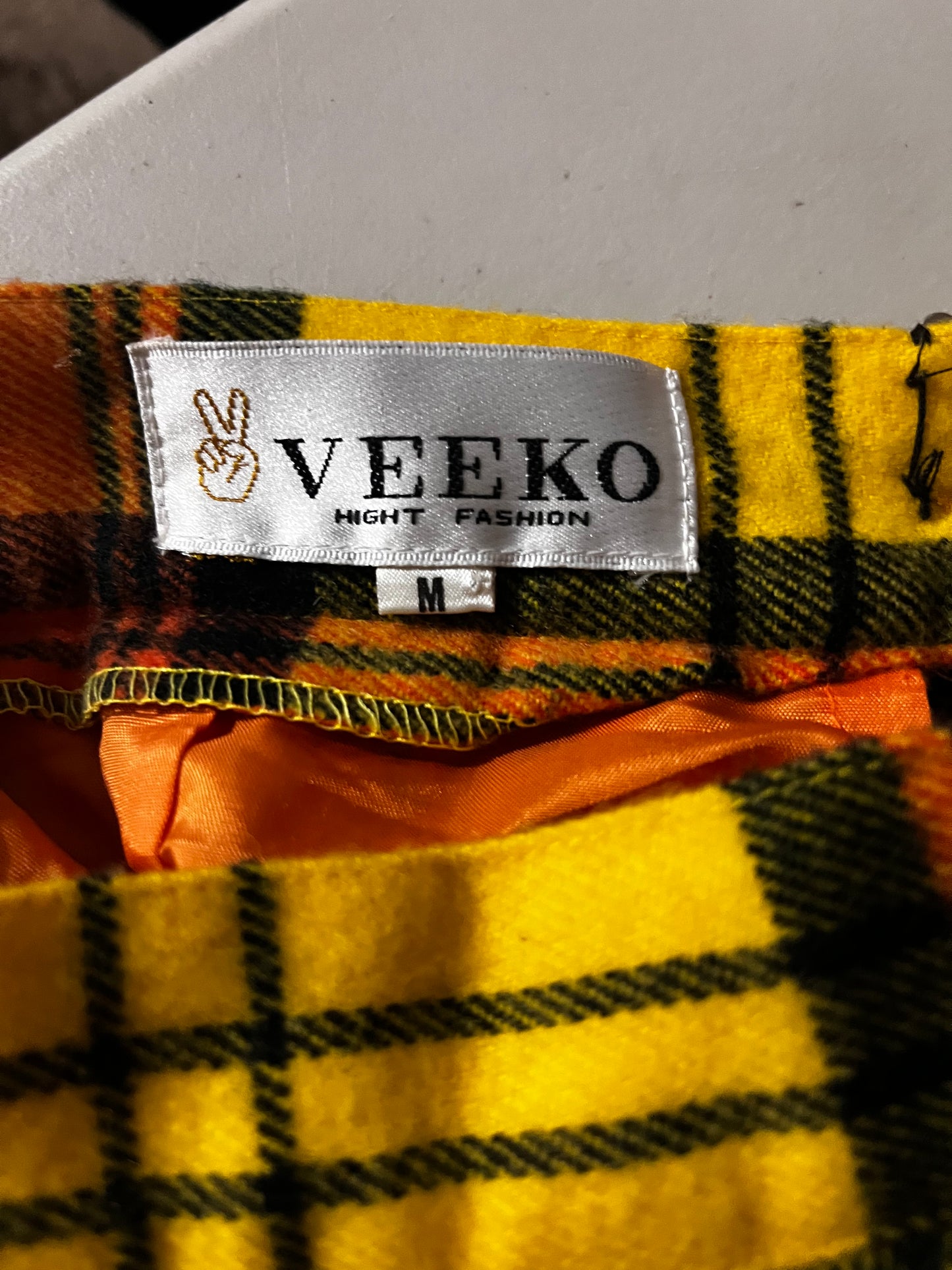 yellow and orange pleated wool plaid skirt