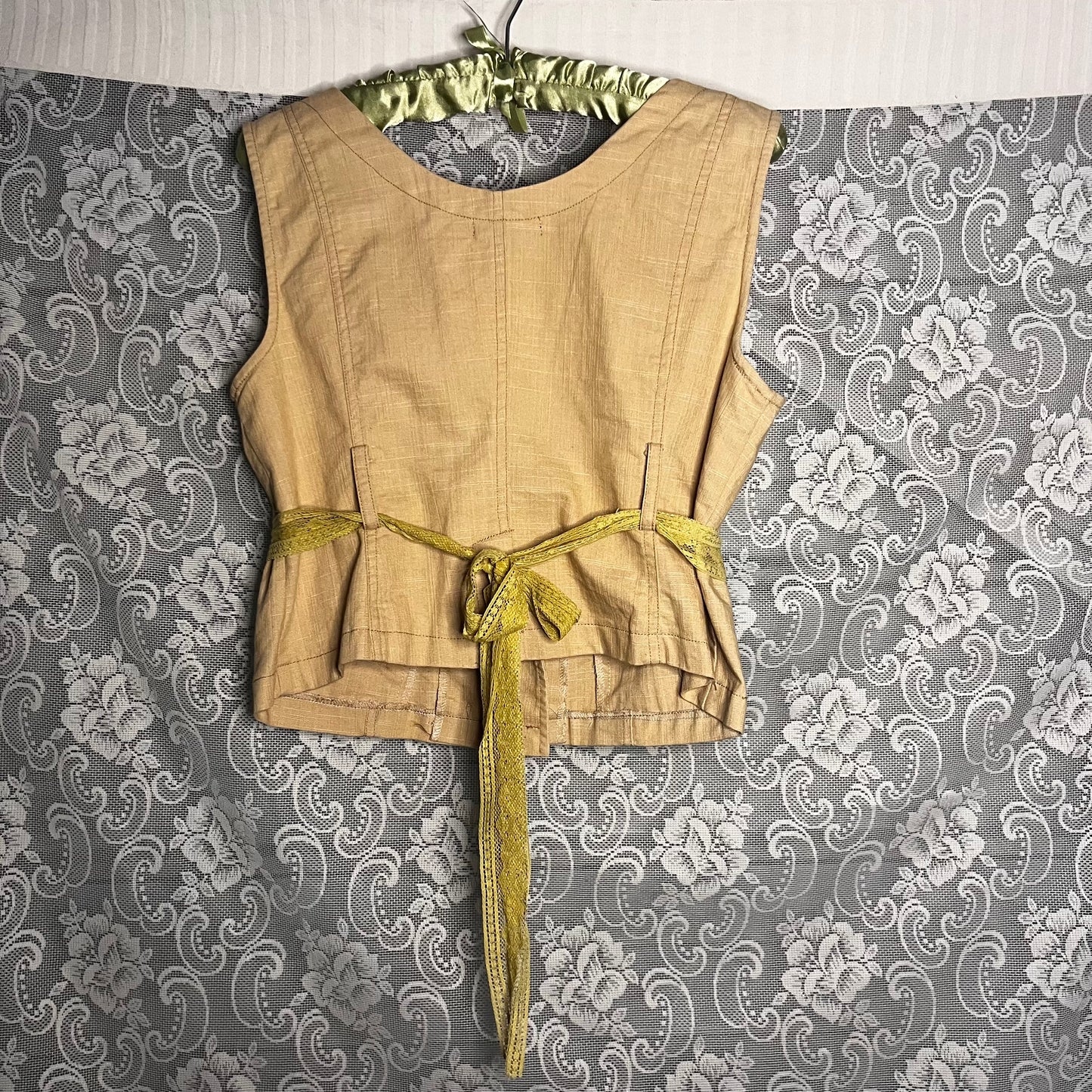 beige button-up + green ribbon vest